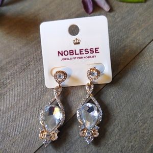 Crystal pave stone teardrop dangle post earrings. Rose gold, crystal.